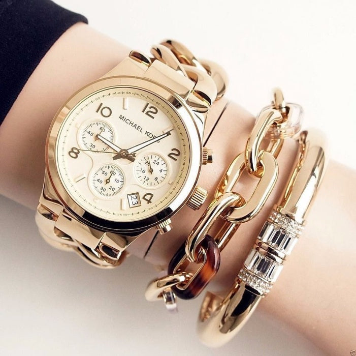 Michael Kors Runway Twist Gold Dial Gold Steel Strap Watch for Women - MK3131